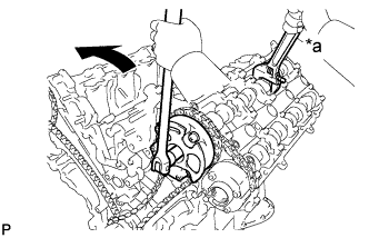 Land Cruiser. 3UR-FE Camshaft - Removal. Hold the hexagonal portion of the camshaft with a wrench and loosen the bolt.