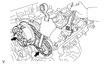 Engine unit 1GR-FE Disassembly. Hold the hexagonal portion of the camshaft with a wrench, and remove the 2 bolts, camshaft timing gear, camshaft timing sprocket and No. 2 chain.